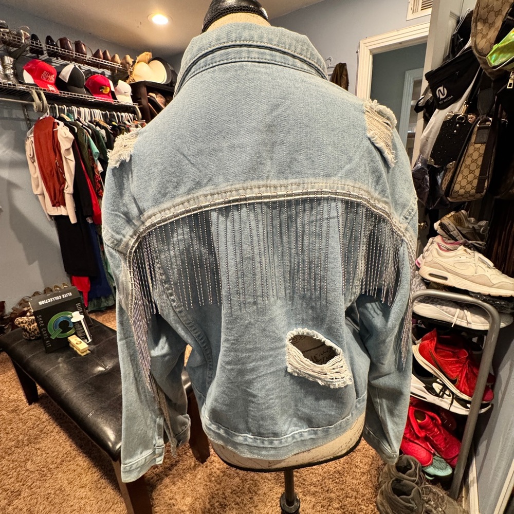 Never worn Denim Jacket with Distressed Details